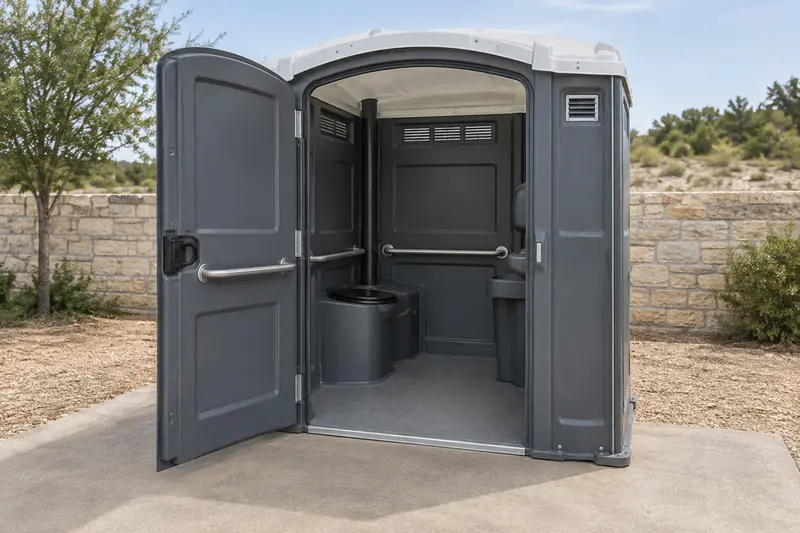 Wider-entry restroom with doorway and internal grab rails visible