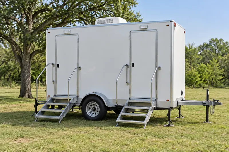 Restroom trailer with separate external entrances